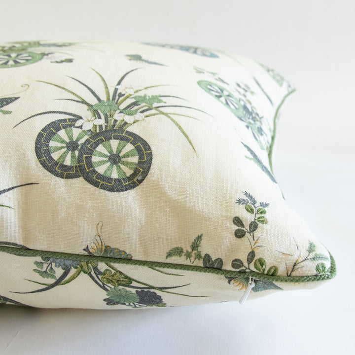 green and blue chariots and butterfly botanical print pillow with green cording