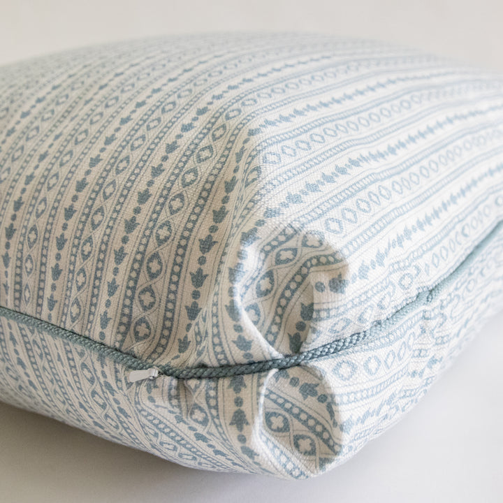 blue geometric stripe pillow with Turkish corner and aqua cording