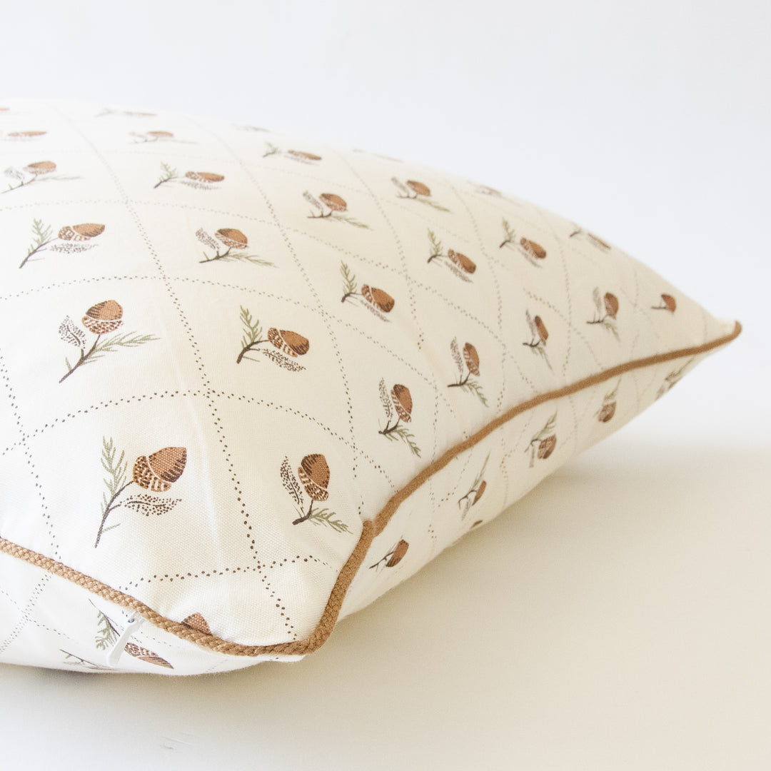 acorn botanical pattern pillow with brown contrast cording
