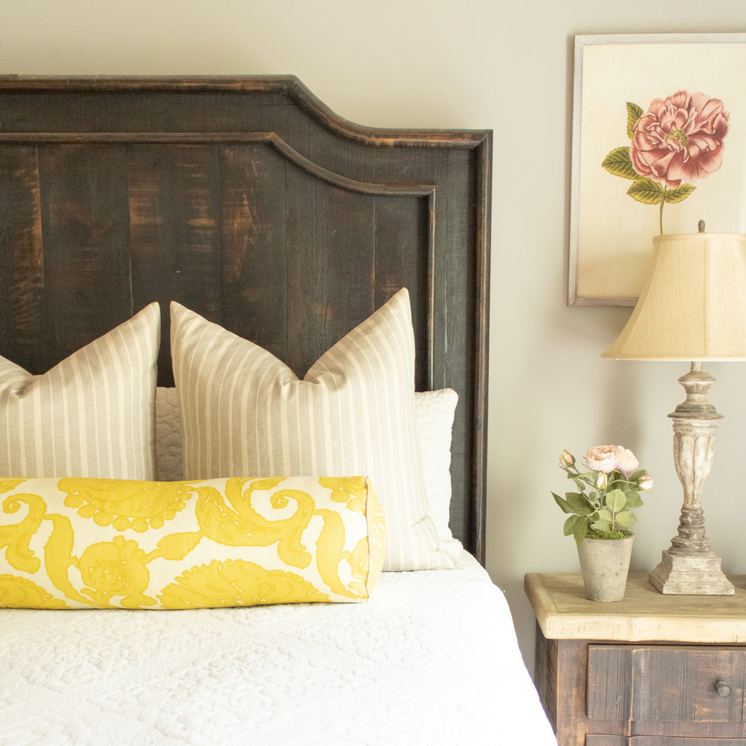 Yellow floral linen bolster